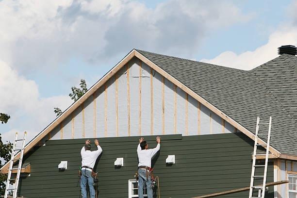 Professional Siding technician working in Millheim, PA